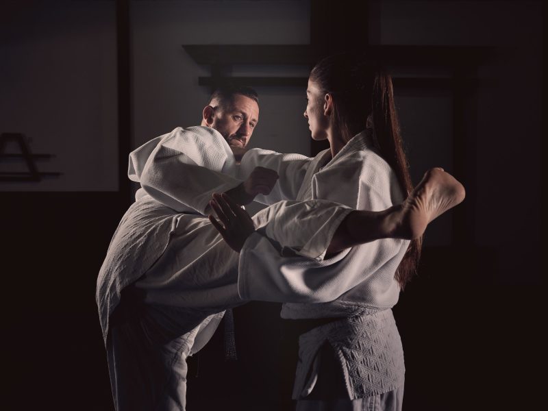 Man and woman fighting during Krav Maga training